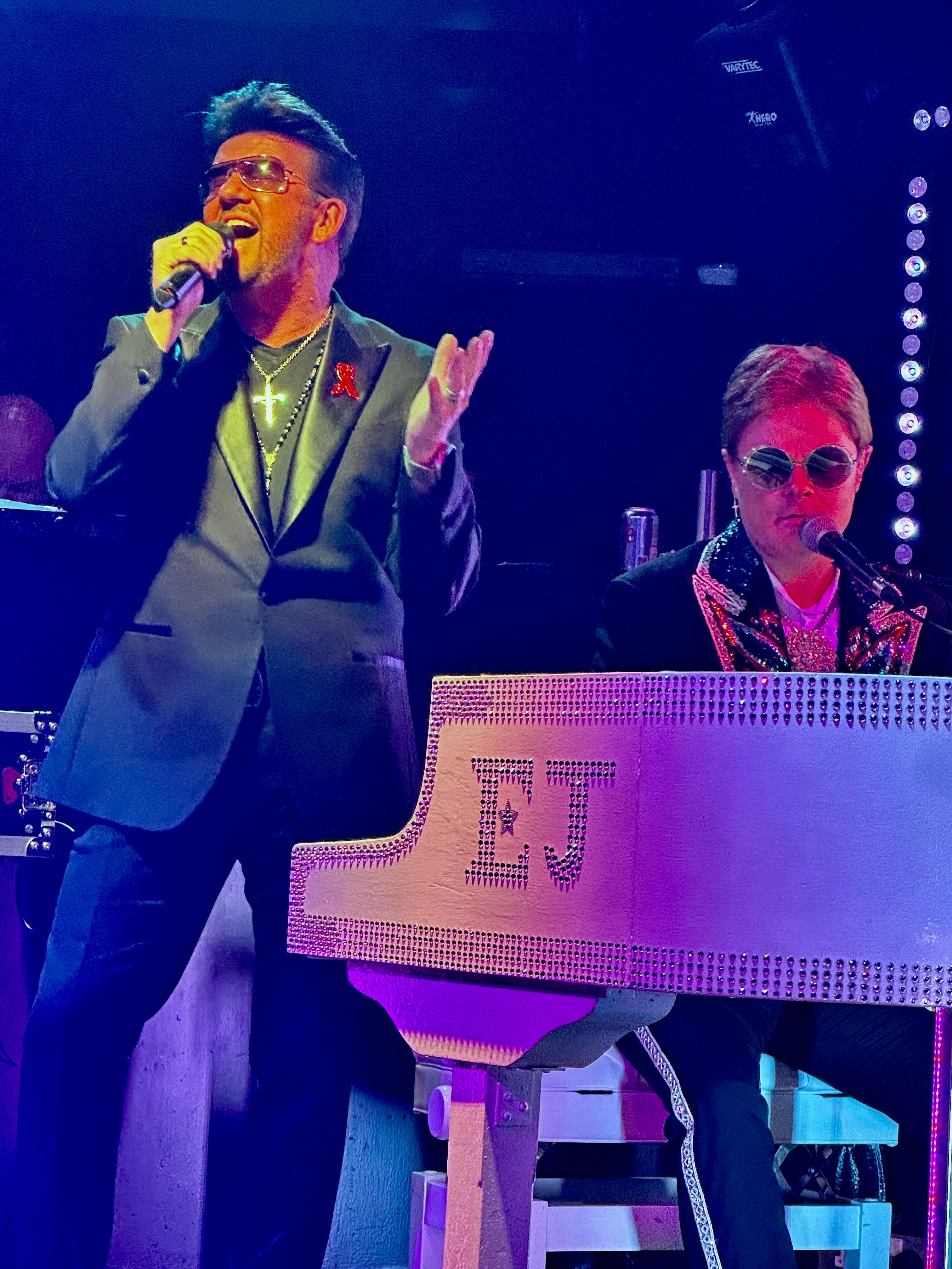 Steve Mitchell singing with Elton tribute at piano