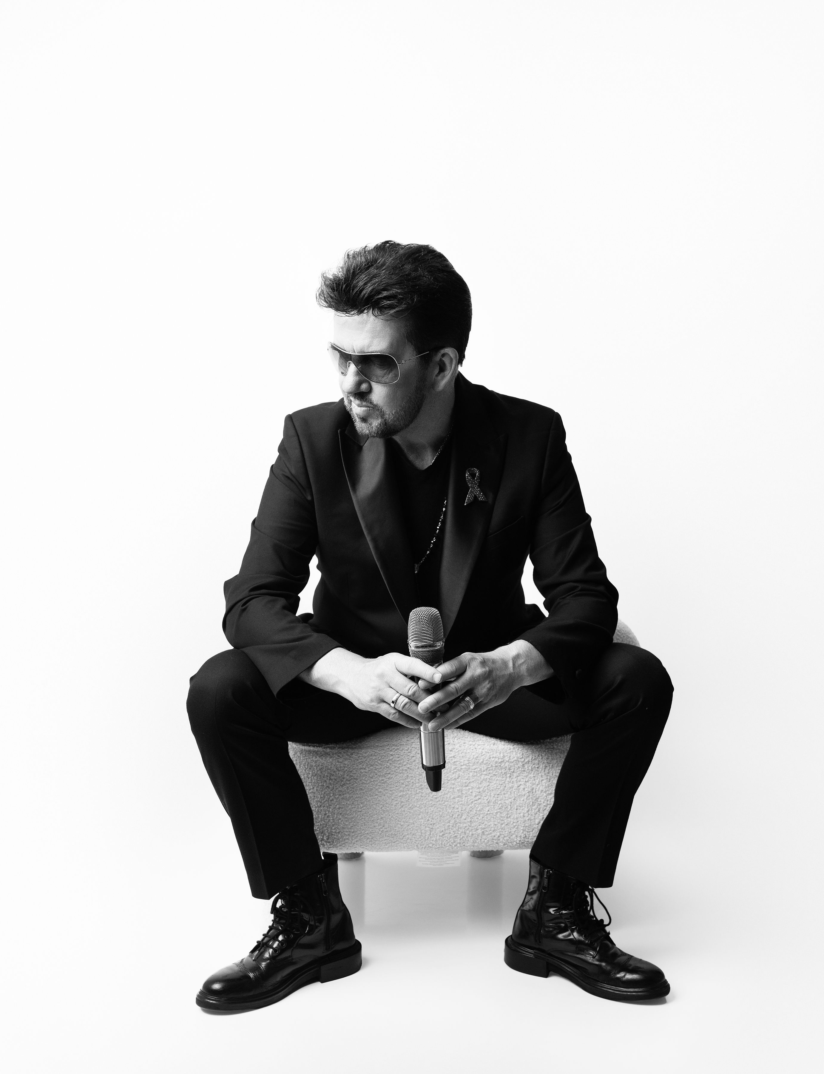 Steve Mitchell capturing George Michael's iconic vocal style